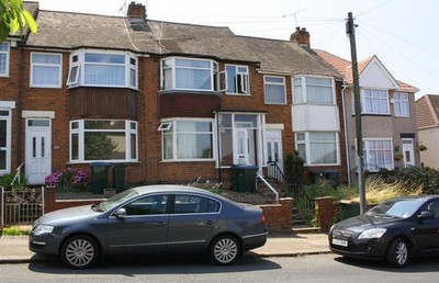 Photo 6x4 Houses of The Martyrs' Close Coventry There is an OS benchmark  c2017