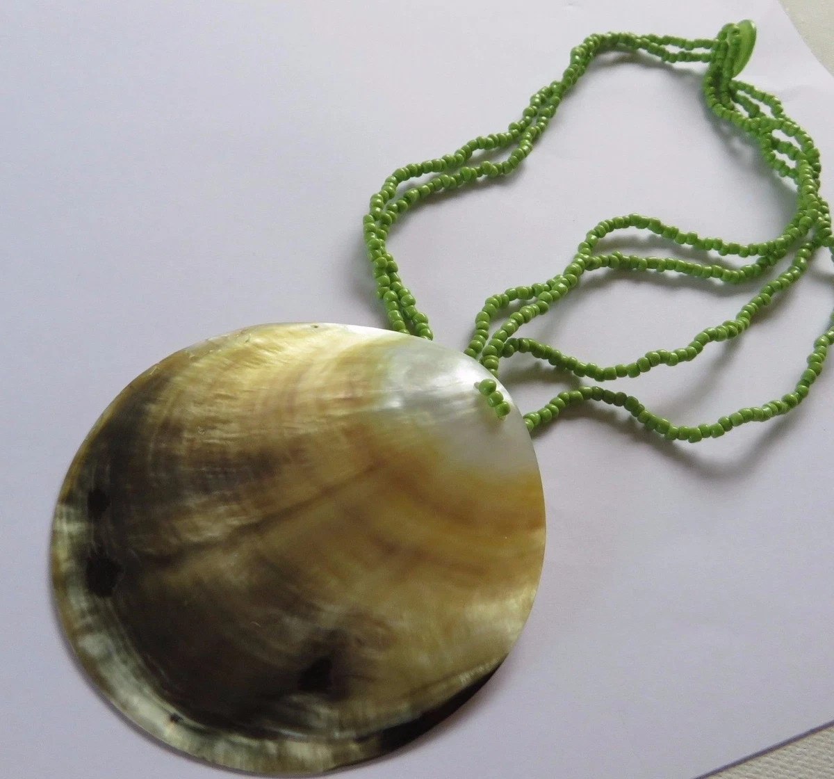 Flat disc shop necklace