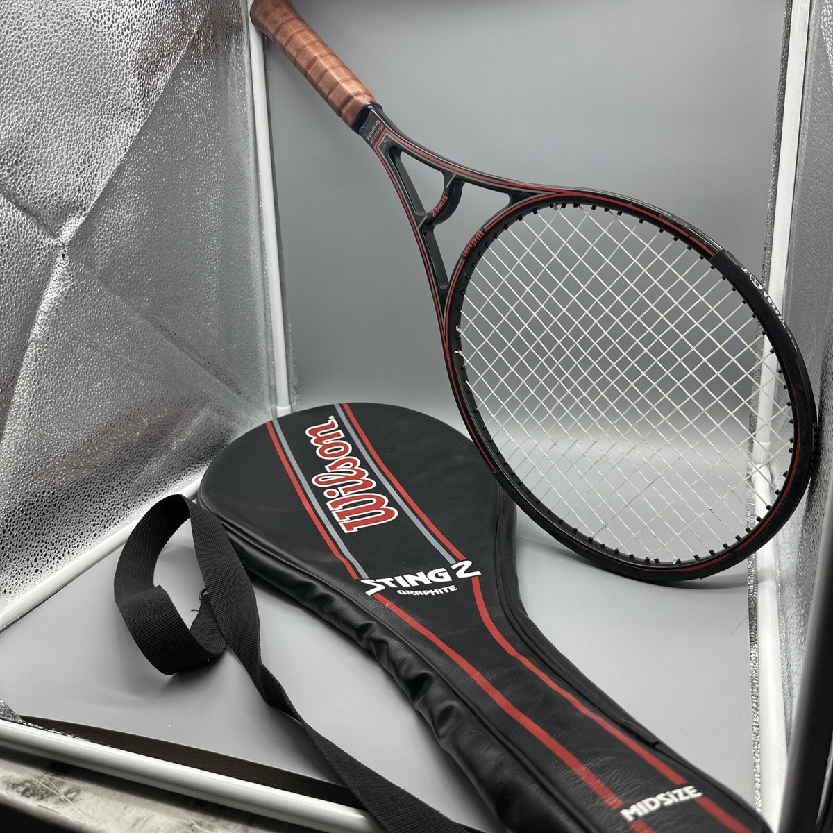 Wilson Midsize Graphite Sting 2 Tennis Racquet 4 1/2 LEATHER Wilson Midsize Graphite Sting 2 Tennis Racquet 4 1/2 LEATHER