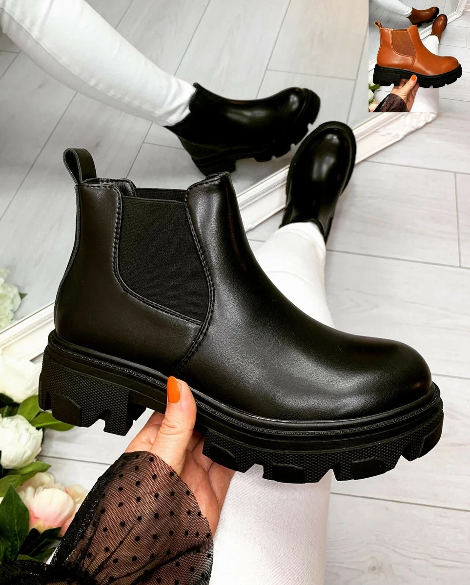 Cleated sole ankle clearance boots