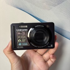 Samsung PL70 Digital Camera 12.20 MP 5x Optical Zoom AE/FE Lock