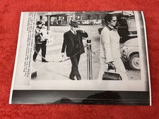 CHARLIE CHAPLIN original AP wire photo walks in Milan w/ wife Oona on 75th bday
