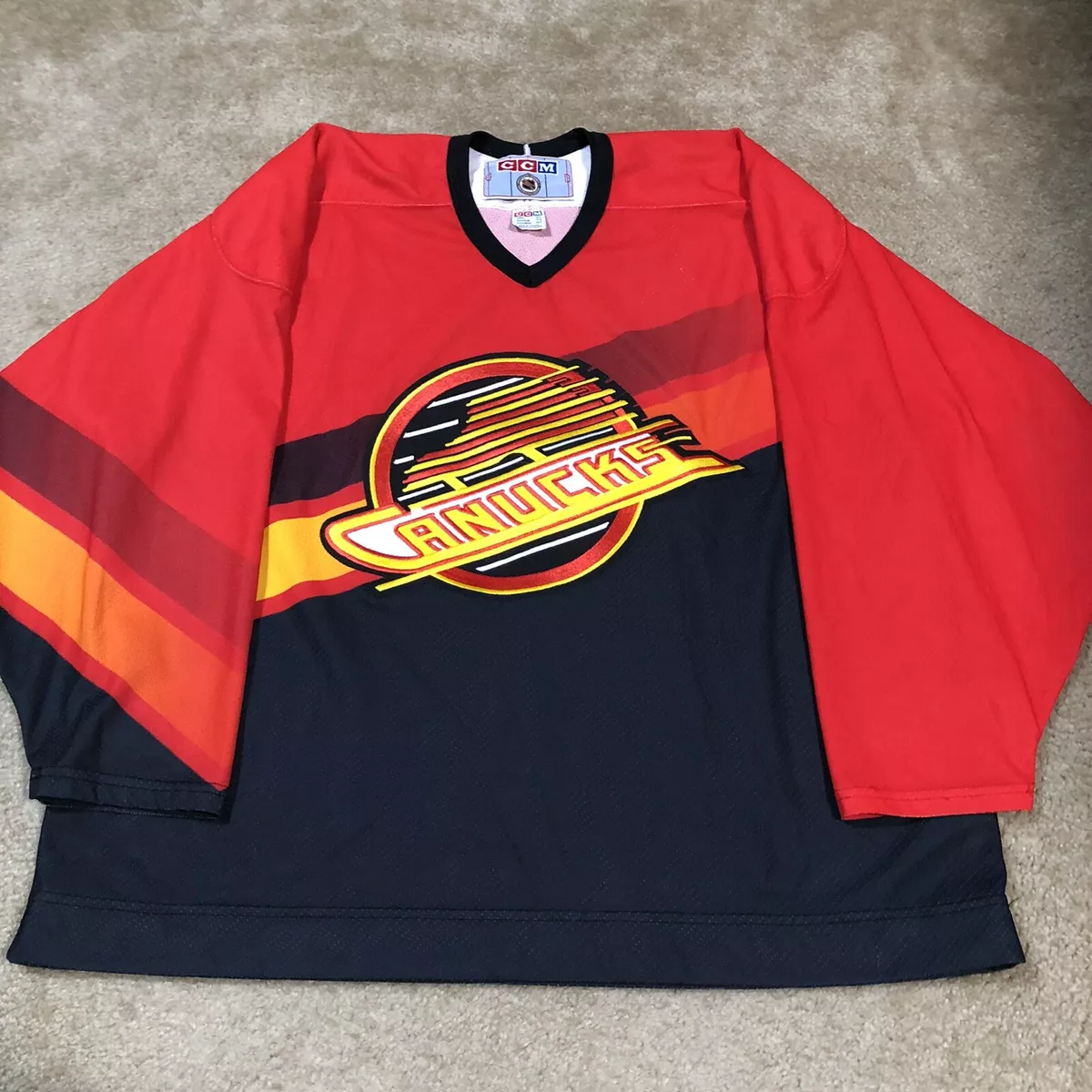 CCM Vancouver Canucks Salmon Gradient Flying Skate NHL Jersey Red