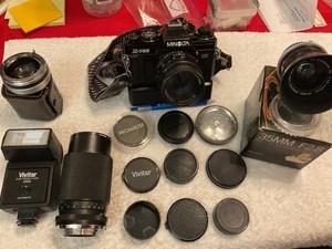 Minolta X-700 body w/3 lenses, motor drive, flash, converter, cable release, bag