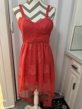 GB coral red high-low dress with a lace overlay and a sweetheart neckline. Small