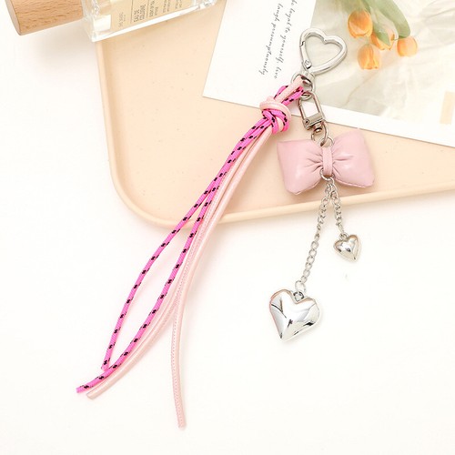 Llavero colgante corazón arco cuero multicolor equipaje accesorios borla dijes - Imagen 15 de 22