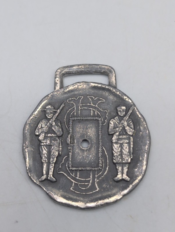Spanish-American War era silver watch fob with two soldiers