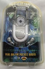 Coby Mini AM/FM DBBS Pocket Radio Silver With Earphones  Neck Strap CX-7 New