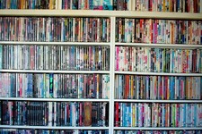 Mystery box of 60 DVDs  inspected  playable  many genres  free shipping GA-1 