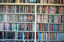 Mystery box of 60+ DVDs—inspected & playable—many genres—free shipping (GA-1)