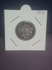 1990 10 cent proof coin. Brilliant coin in 2x2 holder