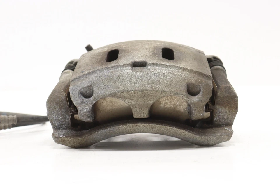 Pinza de freno de disco delantera izquierda Nissan Armada 2005-2024 OEM Foto 2 de 4