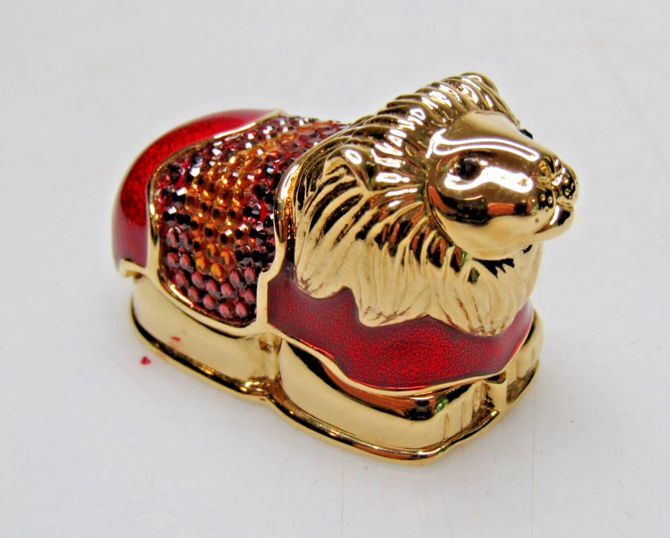 Perfume sólido Estee Lauder Beyond Paradise Legendary Lion de Judith Leiber con caja Foto 4 de 4