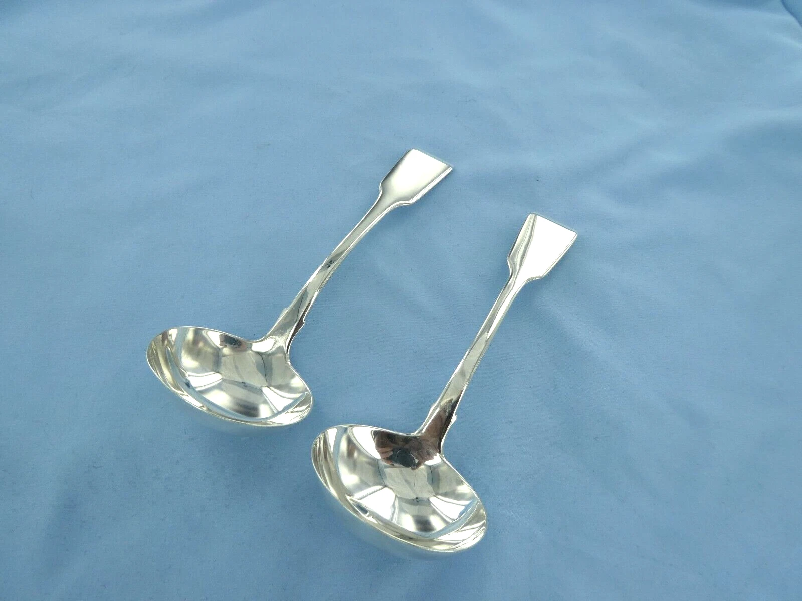 AN ANTIQUE PAIR OF STERLING SILVER FIDDLE BACK,SAUCE LADLES LONDON 1859.
Opens in a new window or ta