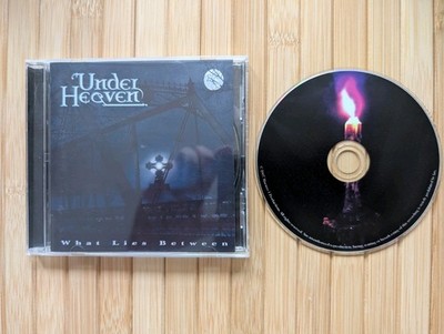 Under Heaven - What Lies Between CD 2013 In Very Good Condition 