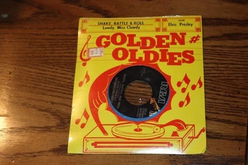 NEW VINYL 45 ELVIS PRESLEYSHAKE RATTLE ROL SEALED WITH DISPLAY CARD NEW UNPLAYED