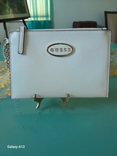 WHITE GUESS WRISTLET WITH GOLD HARDWEAR CONCERT AND MAKE UP BAG