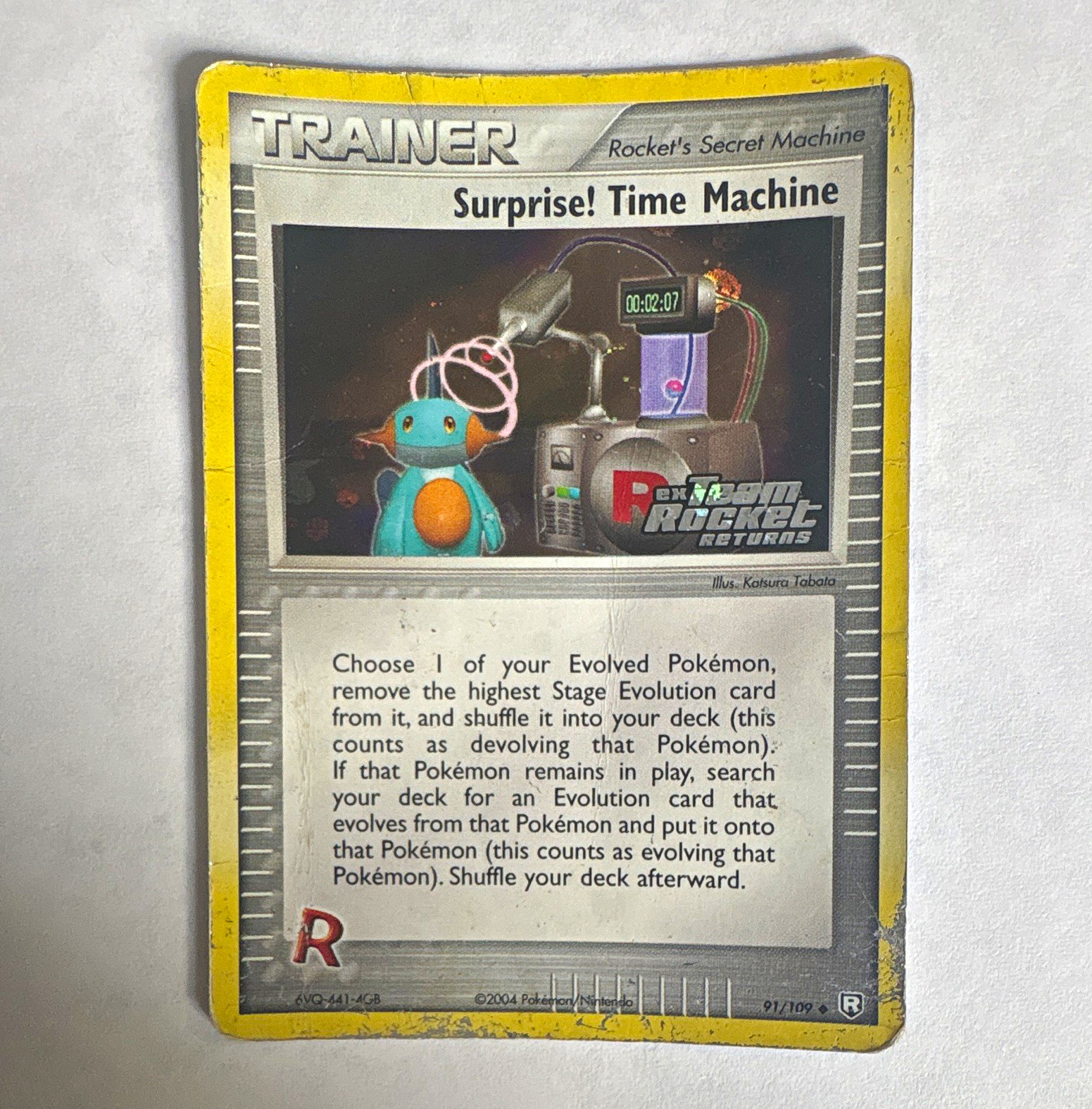 Surprise! Time Machine Reverse Holo 91/109 EX Team Rocket Returns Trainer Unc EN