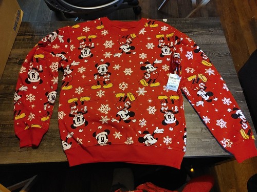 red sweatshirt with snowflakes