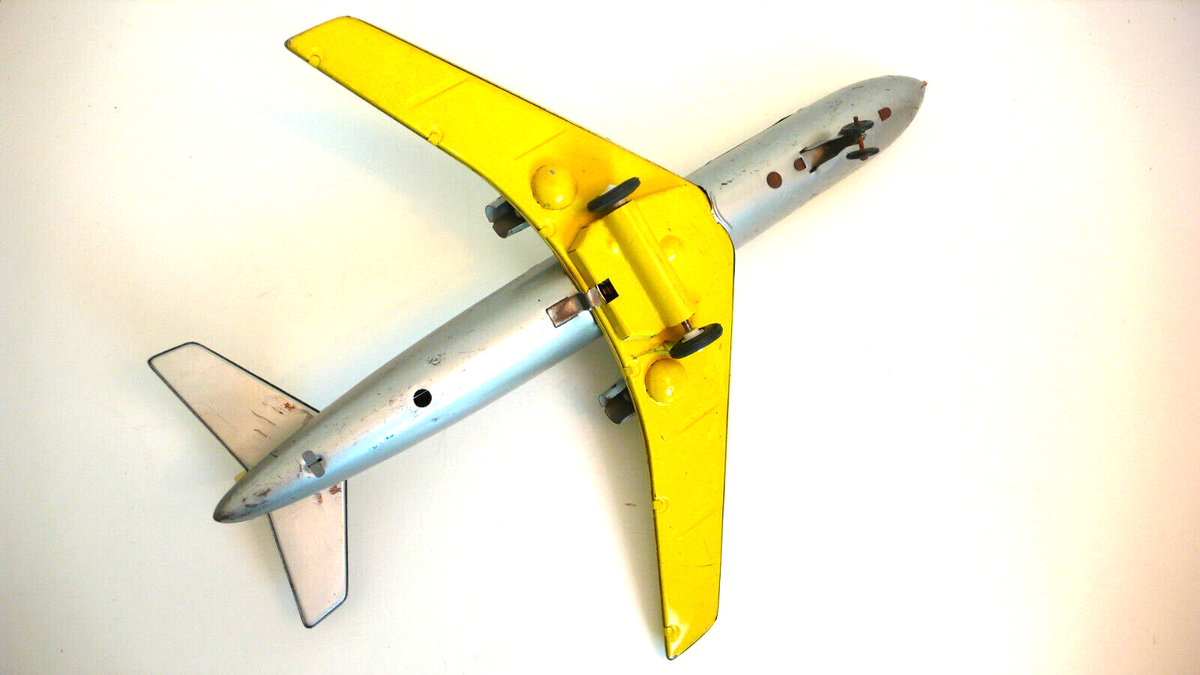 Joustra, France - 22 cm - Avion en tôle avec siège - Catawiki