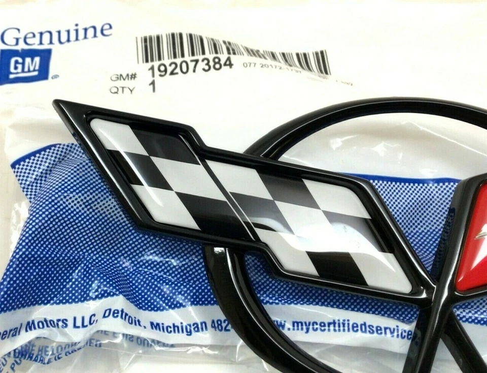 1997 - 2004 雪佛兰科尔维特前保险杠筋膜中心徽章旗帜全新 OE — 第 2/4 张图片
