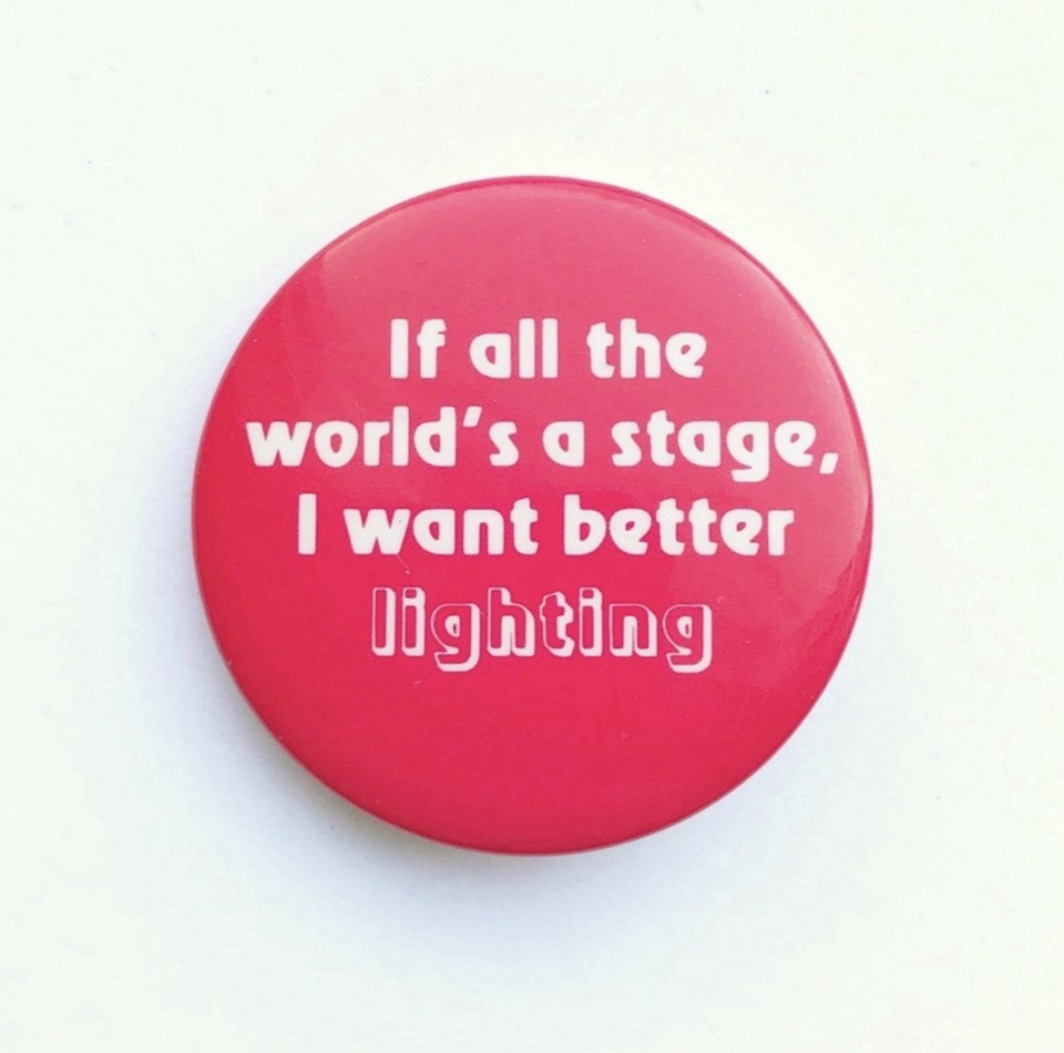 A genuine vintage USA novelty pin button with a theatrical "Better Lighting" gag — the kind of wearable absurdist humor that stops people in their tracks.