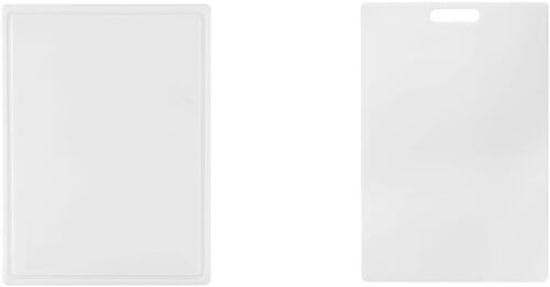 Reversible polyethylene cutting board with juice trough and easy to grip handle,