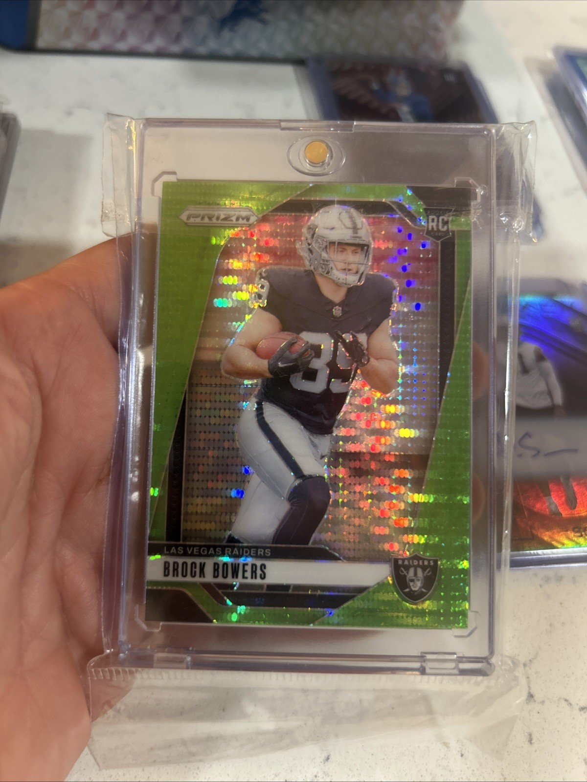 2024 Panini Prizm - Rookies Neon Green Pulsar Prizm #315 Brock Bowers (RC)