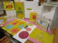 Accuquilt Go Fabric Die Cutter with Many Dies Great Condition