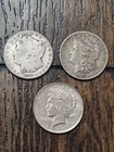 Lot Of 3 Silver Dollar Coins 1885 & 1887 Morgans And 1922 Peace Dollar