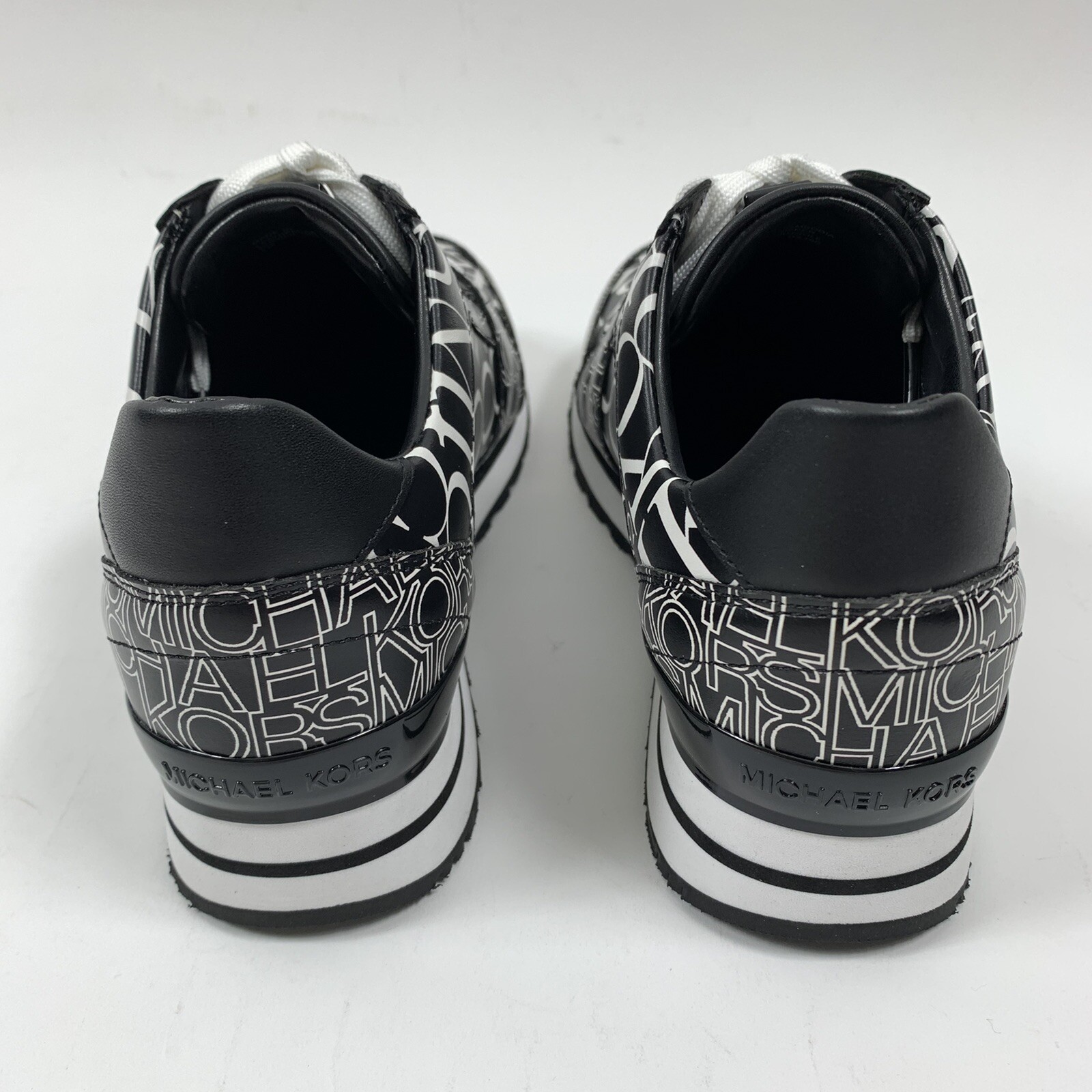billie newsprint logo leather trainer