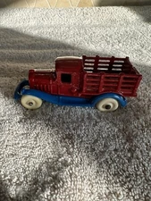 A C Williams Blue & Red Take Apart Cast-Iron Mack Stake Truck 4 1/2"