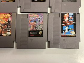 Nintendo NES console bundle with controllers, zapper, and games Tested