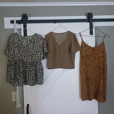 Animal Print Blouse by SHEIN, Size S and Printed Sundress by Arizona size LG.