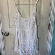 Vintage Brandy Melville white mini dress with ruffled hem, size S