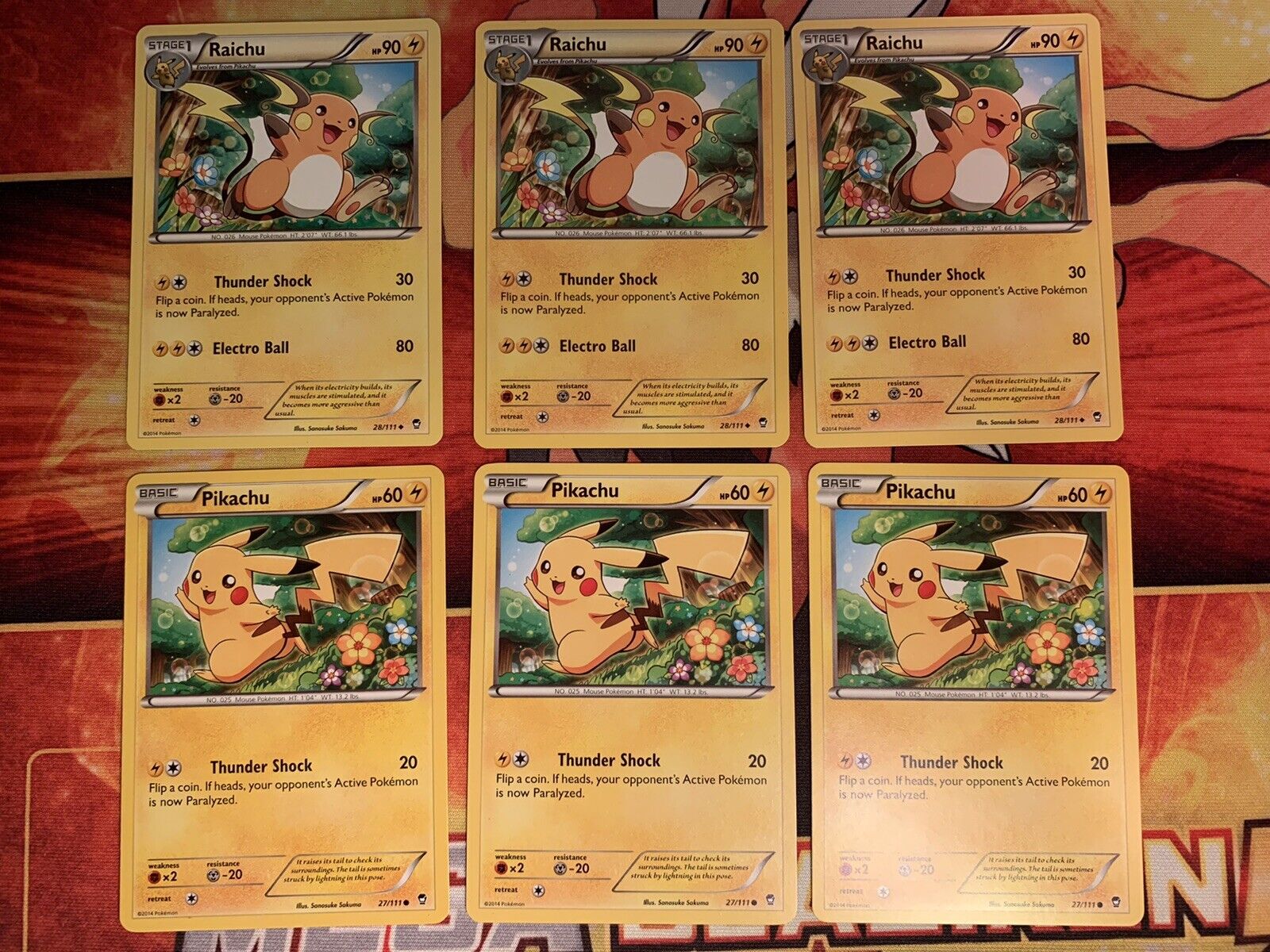 RAICHU 28/111 & PIKACHU 27/111- 2 EVOLUTION POKEMON CARDS- FURIOUS  FISTS-NM/M