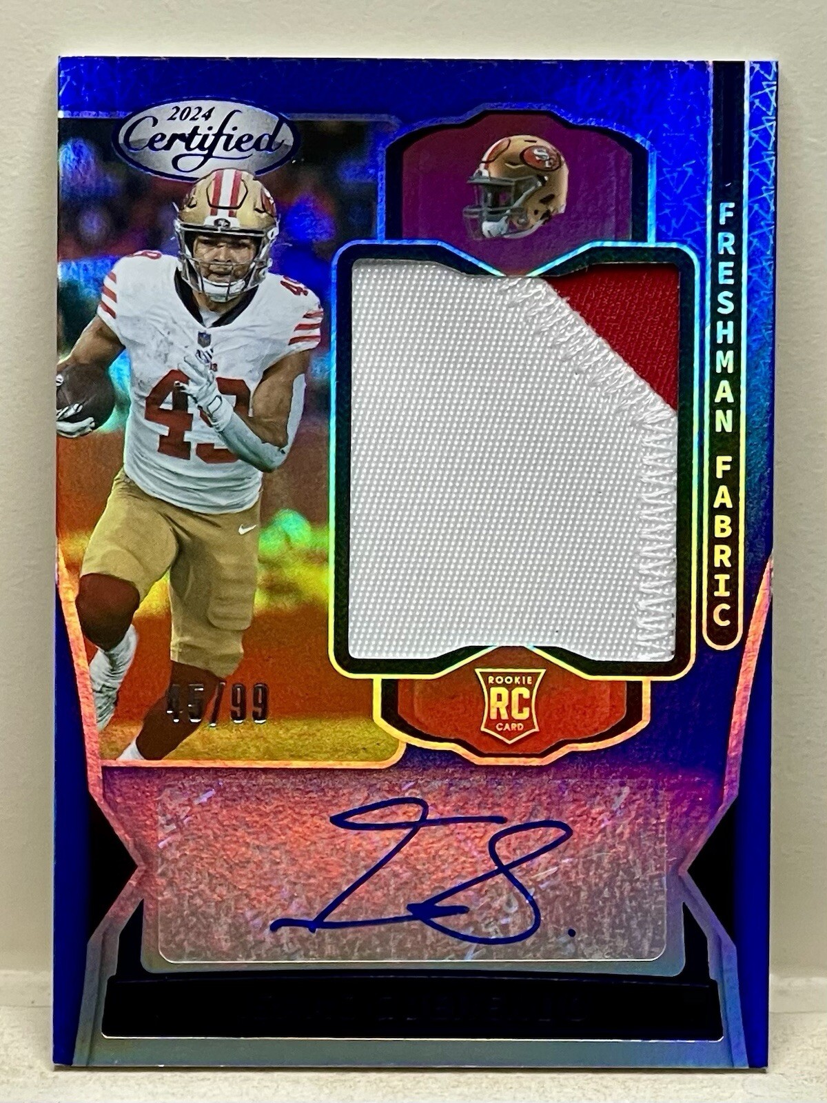 Isaac Guerendo 2024 Panini Certified Freshman Fabric Blue RC Patch Auto /99 RPA