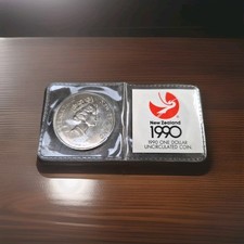 New Zealand 1990 $1 Waitangi Treaty 1   One  Dollar Coin in wallet