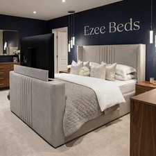 Image of Madison Upholstered TV Bed Frame With Gas Lift Storage In Plush Velvet Fabric UK