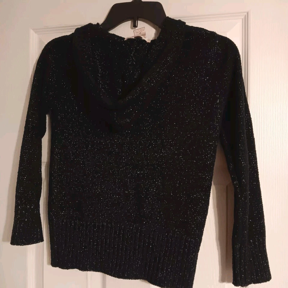 *Hilaración* Suéter Niñas, Talla Mediana, Negro Con Manchas Plateadas, Con Capucha Foto 2 de 4