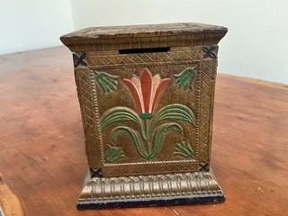 Antique cast Iron coin bank with embossed floral design Late 1800s