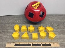 Vintage Tupperware Shape O Sorter Toy Red Blue Ball with 10 Yellow Shapes