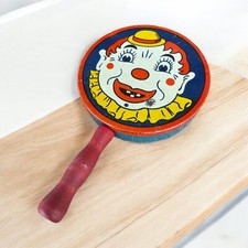 Vintage KIRCHHOF Tin Noisemaker Clown face, Red Wood Handle