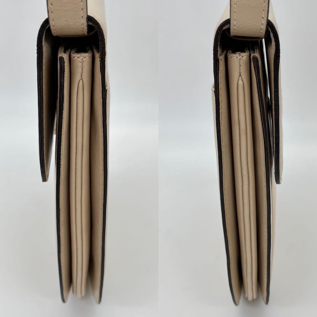 Borsa a tracolla Yves Saint Laurent Cassandra con logo e scatola in rilievo lucertola ecc