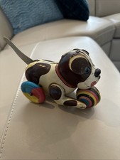 Antique Vintage Tin Toy Colorful Dog With A Ball On Wheels Tail