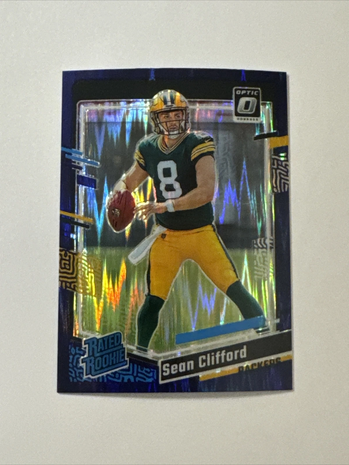 Sean Clifford 2023 Donruss Optic RC #242 Rated Rookie Purple Shock Prizm Packers