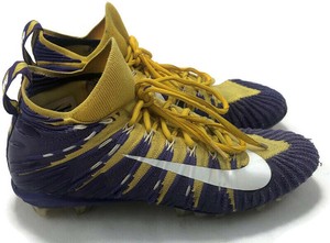 purple and gold nike football cleats