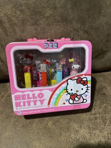 NEW! HELLO KITTY Pez Dispensers and Candy in Tin Lunchbox SEALED