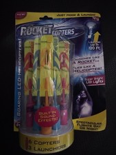Rocket Copters Slingshot LED Light Up 6 Copters 3 Launchers New Sealed Fun Toy