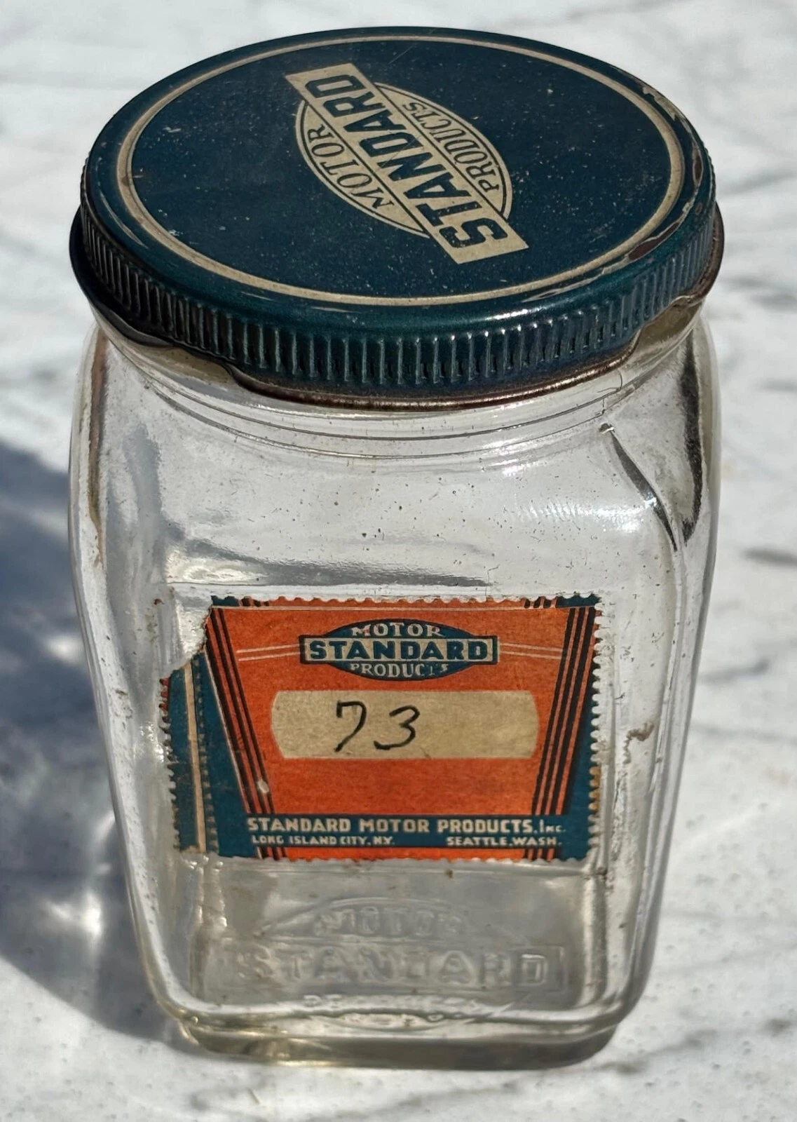 Vintage STANDARD MOTOR PRODUCTS Embossed Glass Jar w/ Lid and Paper Label